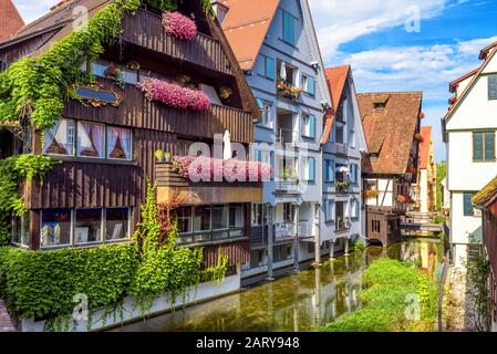 Vintage street with houses decorated by flowers in old town of Ulm, Germany. Nice view of historical Fisherman`s Quarter in summer. It is a landmark o Stock Photo